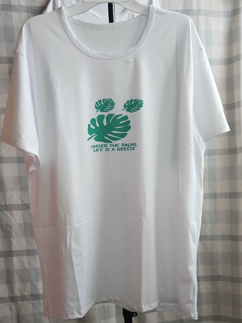 White Graphic Tee with Green Palm Print. Size: Large.